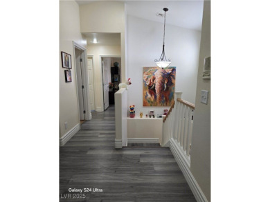 Discover this stunning two-story home nestled in the prestigious on Rhodes Ranch Golf Club in Nevada - for sale on GolfHomes.com, golf home, golf lot