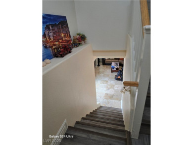 Discover this stunning two-story home nestled in the prestigious on Rhodes Ranch Golf Club in Nevada - for sale on GolfHomes.com, golf home, golf lot