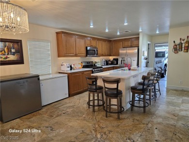 Discover this stunning two-story home nestled in the prestigious on Rhodes Ranch Golf Club in Nevada - for sale on GolfHomes.com, golf home, golf lot