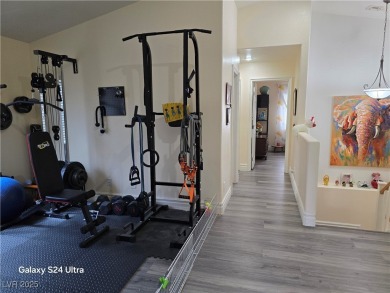 Discover this stunning two-story home nestled in the prestigious on Rhodes Ranch Golf Club in Nevada - for sale on GolfHomes.com, golf home, golf lot