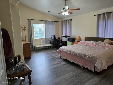 Discover this stunning two-story home nestled in the prestigious on Rhodes Ranch Golf Club in Nevada - for sale on GolfHomes.com, golf home, golf lot