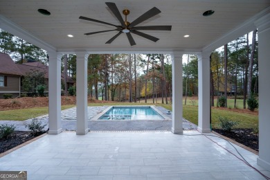 This meticulous custom golf residence is impeccably built with on Reynolds Lake Oconee - The Oconee in Georgia - for sale on GolfHomes.com, golf home, golf lot