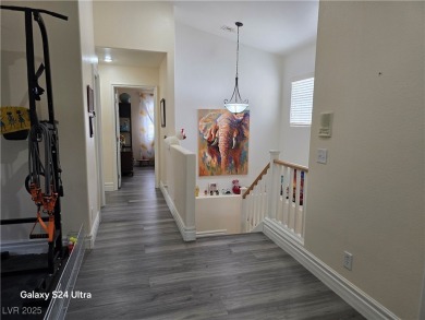 Discover this stunning two-story home nestled in the prestigious on Rhodes Ranch Golf Club in Nevada - for sale on GolfHomes.com, golf home, golf lot