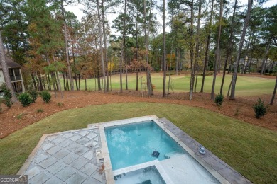 This meticulous custom golf residence is impeccably built with on Reynolds Lake Oconee - The Oconee in Georgia - for sale on GolfHomes.com, golf home, golf lot