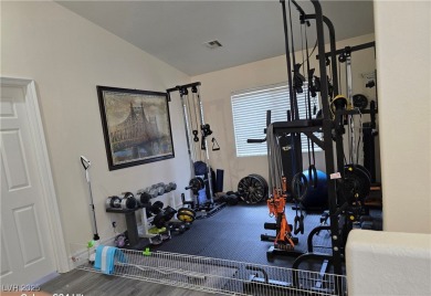 Discover this stunning two-story home nestled in the prestigious on Rhodes Ranch Golf Club in Nevada - for sale on GolfHomes.com, golf home, golf lot