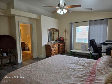 Discover this stunning two-story home nestled in the prestigious on Rhodes Ranch Golf Club in Nevada - for sale on GolfHomes.com, golf home, golf lot