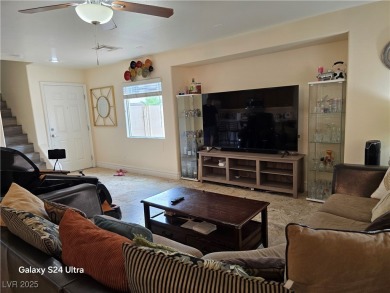 Discover this stunning two-story home nestled in the prestigious on Rhodes Ranch Golf Club in Nevada - for sale on GolfHomes.com, golf home, golf lot