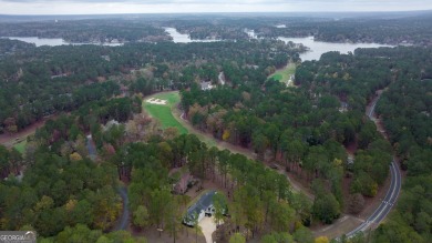 This meticulous custom golf residence is impeccably built with on Reynolds Lake Oconee - The Oconee in Georgia - for sale on GolfHomes.com, golf home, golf lot