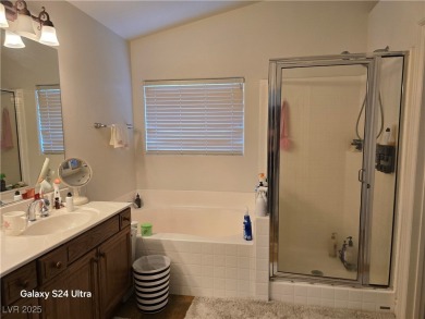 Discover this stunning two-story home nestled in the prestigious on Rhodes Ranch Golf Club in Nevada - for sale on GolfHomes.com, golf home, golf lot