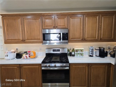 Discover this stunning two-story home nestled in the prestigious on Rhodes Ranch Golf Club in Nevada - for sale on GolfHomes.com, golf home, golf lot