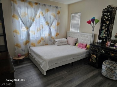 Discover this stunning two-story home nestled in the prestigious on Rhodes Ranch Golf Club in Nevada - for sale on GolfHomes.com, golf home, golf lot