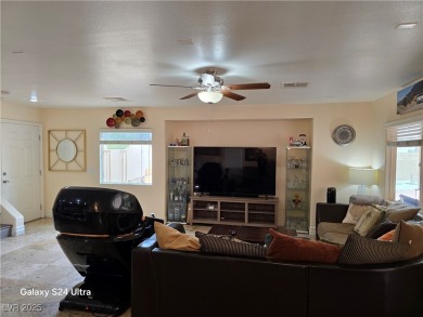 Discover this stunning two-story home nestled in the prestigious on Rhodes Ranch Golf Club in Nevada - for sale on GolfHomes.com, golf home, golf lot