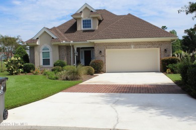 YOU WILL DISCOVER TRANQUIL POND VIEWS & COASTAL COMFORT IN THIS on Ocean Ridge Plantation in North Carolina - for sale on GolfHomes.com, golf home, golf lot