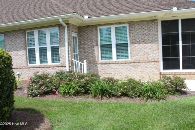 YOU WILL DISCOVER TRANQUIL POND VIEWS & COASTAL COMFORT IN THIS on Ocean Ridge Plantation in North Carolina - for sale on GolfHomes.com, golf home, golf lot