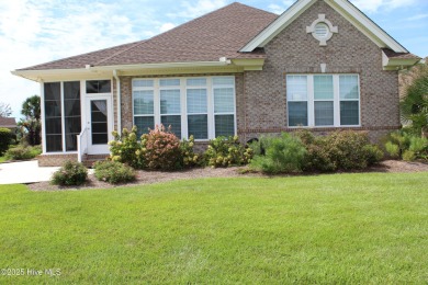 YOU WILL DISCOVER TRANQUIL POND VIEWS & COASTAL COMFORT IN THIS on Ocean Ridge Plantation in North Carolina - for sale on GolfHomes.com, golf home, golf lot
