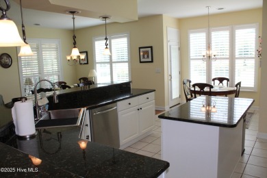 YOU WILL DISCOVER TRANQUIL POND VIEWS & COASTAL COMFORT IN THIS on Ocean Ridge Plantation in North Carolina - for sale on GolfHomes.com, golf home, golf lot