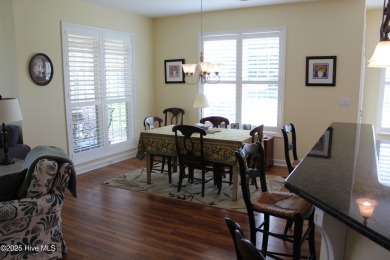 YOU WILL DISCOVER TRANQUIL POND VIEWS & COASTAL COMFORT IN THIS on Ocean Ridge Plantation in North Carolina - for sale on GolfHomes.com, golf home, golf lot