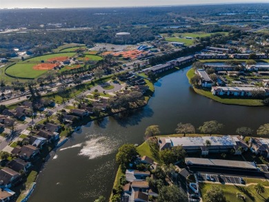 One or more photo(s) has been virtually staged. Villa living at on East Lake Woodlands Country Club in Florida - for sale on GolfHomes.com, golf home, golf lot