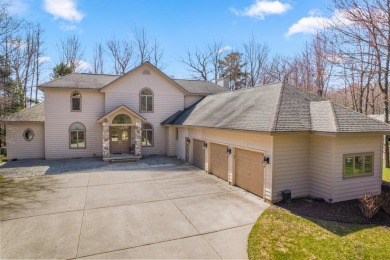This custom-built home sits on the 12th hole of the Lakes Golf on Michaywe Pines Course in Michigan - for sale on GolfHomes.com, golf home, golf lot