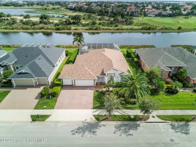 ''Stunning  retreat with a sparkling pool, waterfall, lushly on Duran Golf Course in Florida - for sale on GolfHomes.com, golf home, golf lot