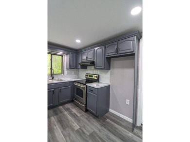 Stunning 4-Bedroom, 3-Bath Contemporary Home in Amenity-Rich on Thornhurst Country Club in Pennsylvania - for sale on GolfHomes.com, golf home, golf lot