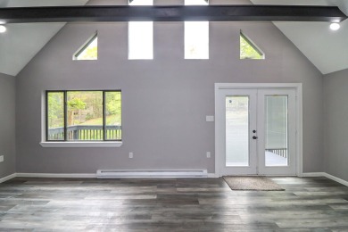 Stunning 4-Bedroom, 3-Bath Contemporary Home in Amenity-Rich on Thornhurst Country Club in Pennsylvania - for sale on GolfHomes.com, golf home, golf lot