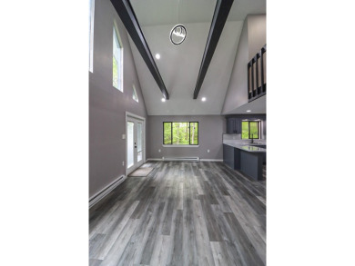 Stunning 4-Bedroom, 3-Bath Contemporary Home in Amenity-Rich on Thornhurst Country Club in Pennsylvania - for sale on GolfHomes.com, golf home, golf lot