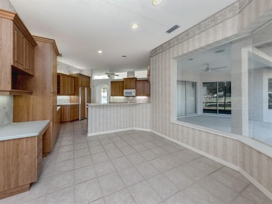 Beautiful Calusa Lakes home with a tranquil setting with an open on Calusa Lakes Golf Club in Florida - for sale on GolfHomes.com, golf home, golf lot