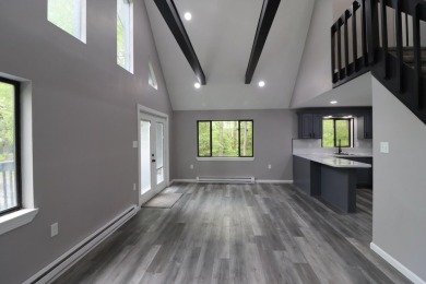 Stunning 4-Bedroom, 3-Bath Contemporary Home in Amenity-Rich on Thornhurst Country Club in Pennsylvania - for sale on GolfHomes.com, golf home, golf lot