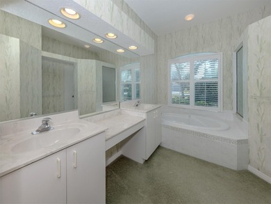 Beautiful Calusa Lakes home with a tranquil setting with an open on Calusa Lakes Golf Club in Florida - for sale on GolfHomes.com, golf home, golf lot