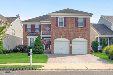 This elegant brick-front home offers the perfect blend of style on Knob Hill Golf Club in New Jersey - for sale on GolfHomes.com, golf home, golf lot