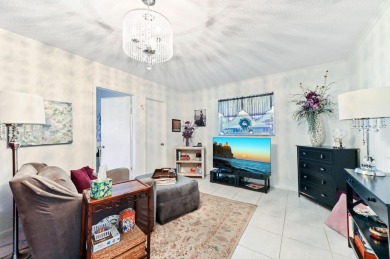 BRAND NEW METAL ROOF! Welcome to this beautiful Challenger model on Leisureville Community Golf Course in Florida - for sale on GolfHomes.com, golf home, golf lot