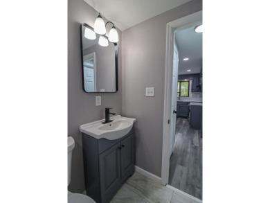 Stunning 4-Bedroom, 3-Bath Contemporary Home in Amenity-Rich on Thornhurst Country Club in Pennsylvania - for sale on GolfHomes.com, golf home, golf lot