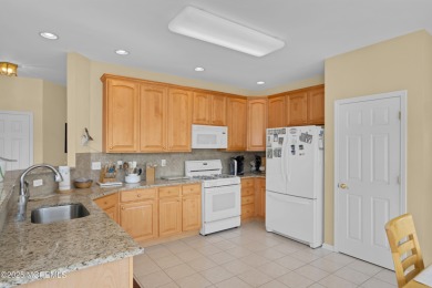 This elegant brick-front home offers the perfect blend of style on Knob Hill Golf Club in New Jersey - for sale on GolfHomes.com, golf home, golf lot