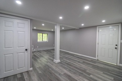 Stunning 4-Bedroom, 3-Bath Contemporary Home in Amenity-Rich on Thornhurst Country Club in Pennsylvania - for sale on GolfHomes.com, golf home, golf lot