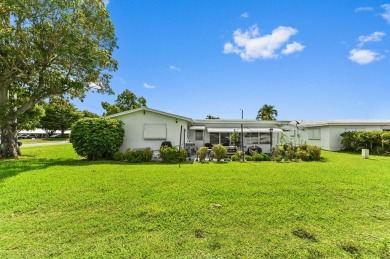 BRAND NEW METAL ROOF! Welcome to this beautiful Challenger model on Leisureville Community Golf Course in Florida - for sale on GolfHomes.com, golf home, golf lot