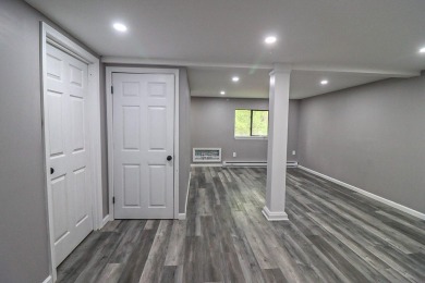 Stunning 4-Bedroom, 3-Bath Contemporary Home in Amenity-Rich on Thornhurst Country Club in Pennsylvania - for sale on GolfHomes.com, golf home, golf lot