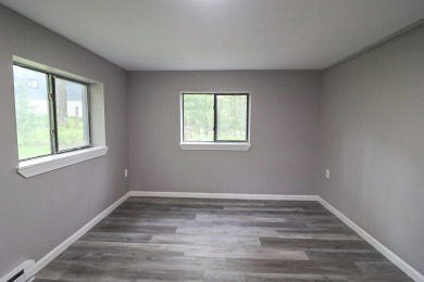 Stunning 4-Bedroom, 3-Bath Contemporary Home in Amenity-Rich on Thornhurst Country Club in Pennsylvania - for sale on GolfHomes.com, golf home, golf lot