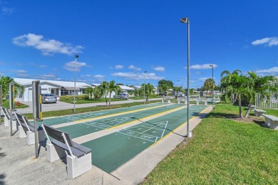 BRAND NEW METAL ROOF! Welcome to this beautiful Challenger model on Leisureville Community Golf Course in Florida - for sale on GolfHomes.com, golf home, golf lot