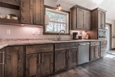 This 2018 Custom built 3B2B home with fountain views on the on Thumper Pond Golf Course in Minnesota - for sale on GolfHomes.com, golf home, golf lot