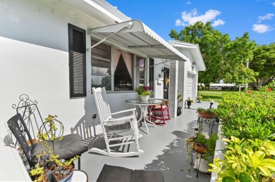 BRAND NEW METAL ROOF! Welcome to this beautiful Challenger model on Leisureville Community Golf Course in Florida - for sale on GolfHomes.com, golf home, golf lot