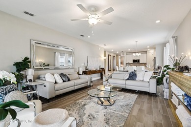 Spectacular home nestled on a quiet cul de sac in a premier on Cimarrone Golf and Country Club in Florida - for sale on GolfHomes.com, golf home, golf lot