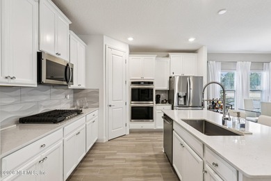 Spectacular home nestled on a quiet cul de sac in a premier on Cimarrone Golf and Country Club in Florida - for sale on GolfHomes.com, golf home, golf lot