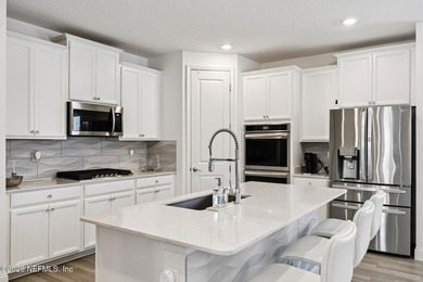 Spectacular home nestled on a quiet cul de sac in a premier on Cimarrone Golf and Country Club in Florida - for sale on GolfHomes.com, golf home, golf lot