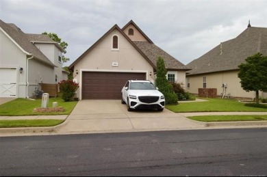 Located in the gated Magnolia Gardens community at Battle Creek on Battle Creek Golf Course in Oklahoma - for sale on GolfHomes.com, golf home, golf lot