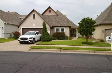 Located in the gated Magnolia Gardens community at Battle Creek on Battle Creek Golf Course in Oklahoma - for sale on GolfHomes.com, golf home, golf lot