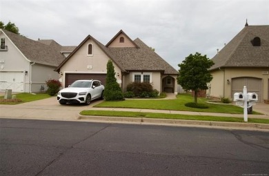 Located in the gated Magnolia Gardens community at Battle Creek on Battle Creek Golf Course in Oklahoma - for sale on GolfHomes.com, golf home, golf lot