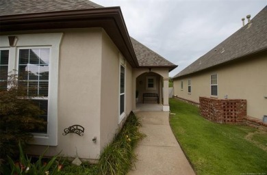 Located in the gated Magnolia Gardens community at Battle Creek on Battle Creek Golf Course in Oklahoma - for sale on GolfHomes.com, golf home, golf lot