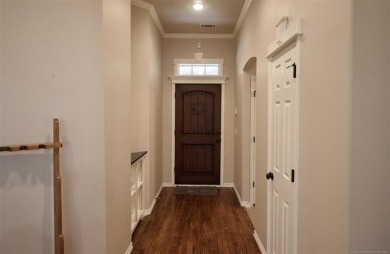 Located in the gated Magnolia Gardens community at Battle Creek on Battle Creek Golf Course in Oklahoma - for sale on GolfHomes.com, golf home, golf lot
