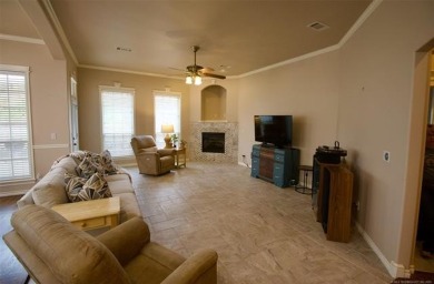 Located in the gated Magnolia Gardens community at Battle Creek on Battle Creek Golf Course in Oklahoma - for sale on GolfHomes.com, golf home, golf lot